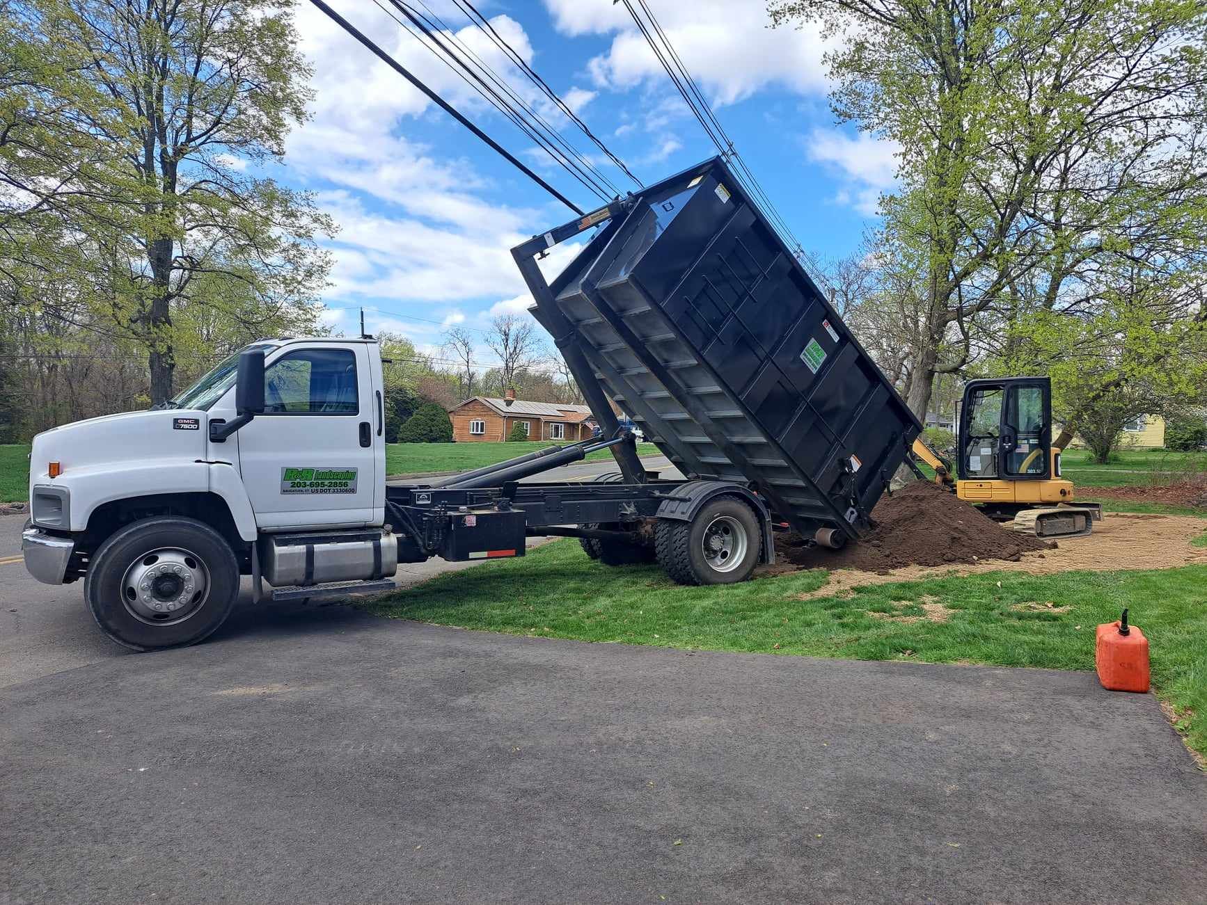 landscaping in naugatuck ct with excavator