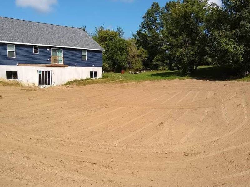 Graded yard in front of a new home in Davenport, IA.