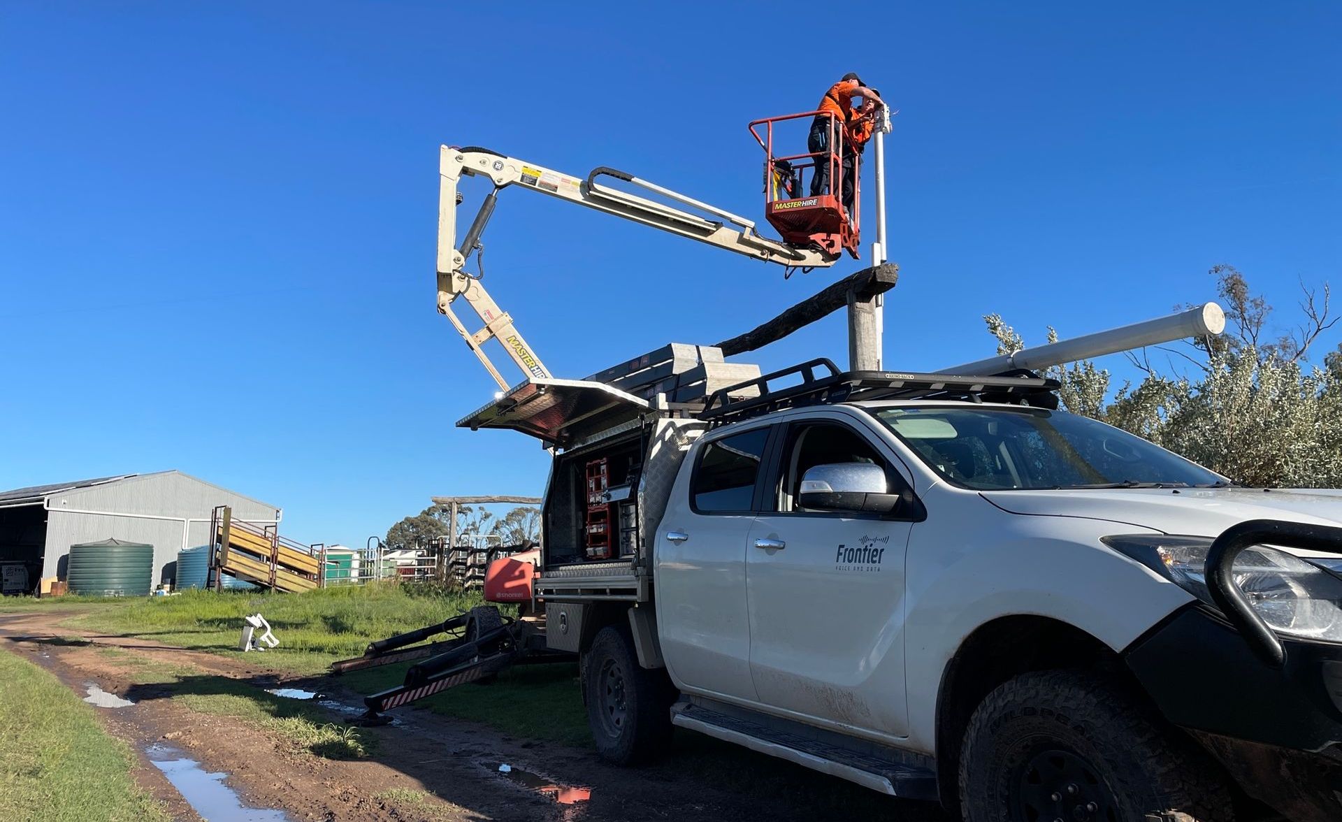 Data Cable Technician On EWP For Security System Installation - Security Company in Toowoomba, QLD