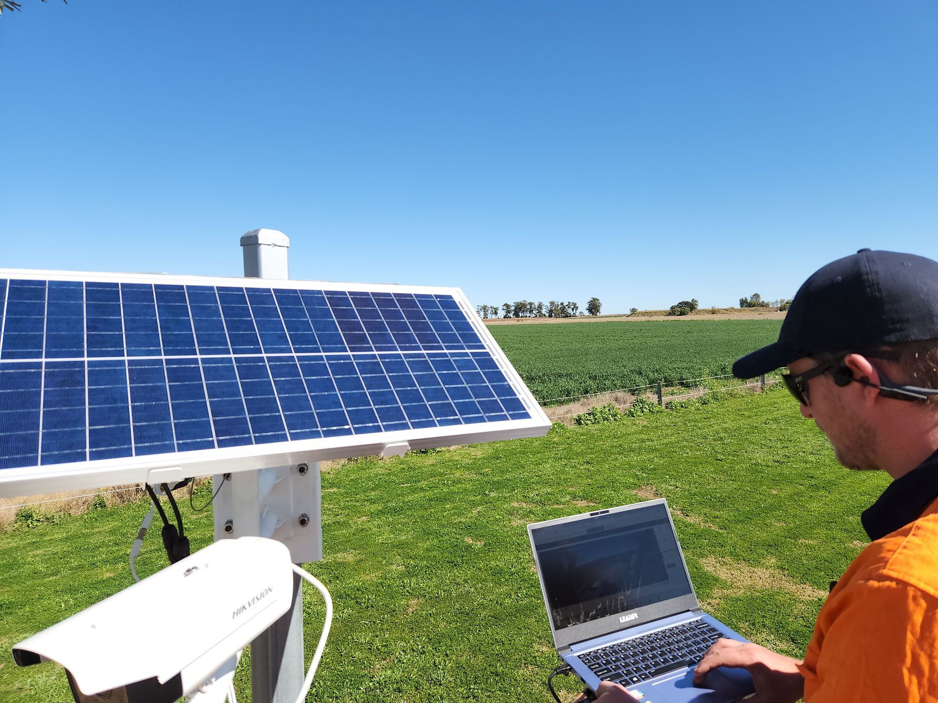 Data Cabling Technician Installing A Custom Solar Security System - Security Systems in Toowoomba, QLD