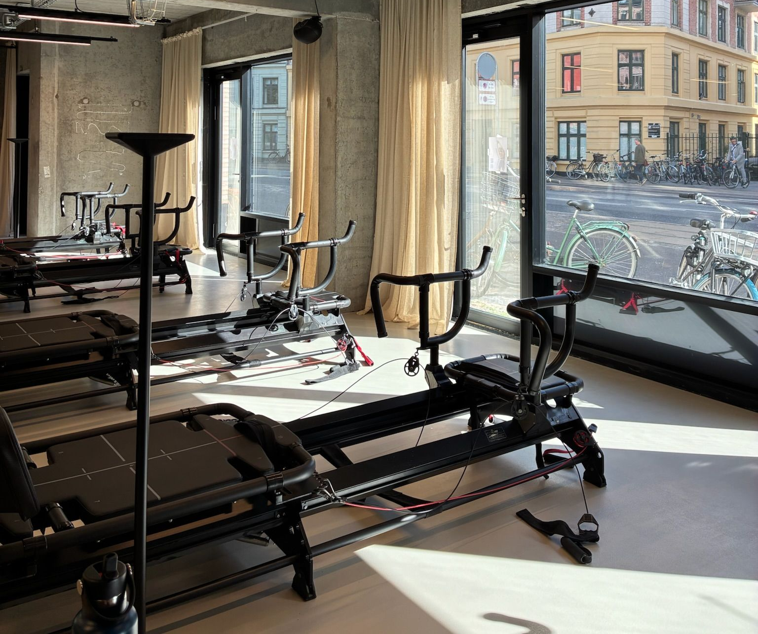 Megaformers lined up by the window inside the Some Good Moves studio in Vesterbro, Copenhagen