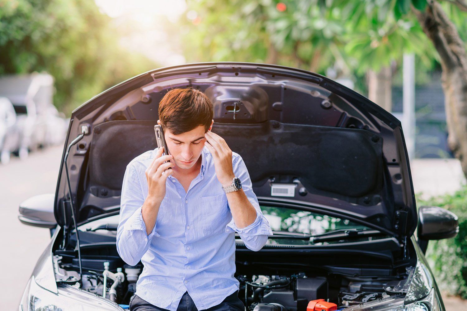 Man with Broken Car — Plano, TX — Domar Automotive, Inc.