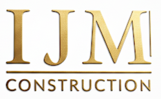 A black and white logo for remodeling ijm construction.
