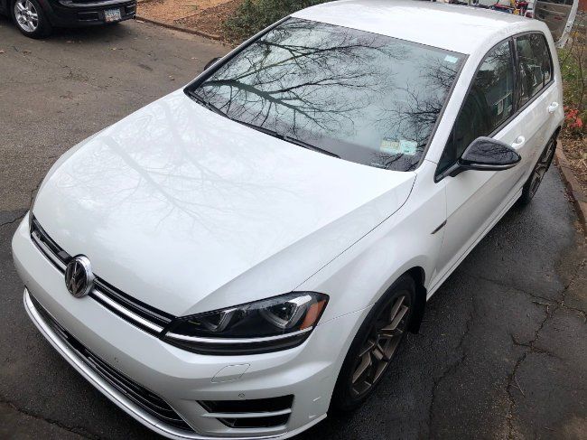 Exterior of a white VW Golf R after detailing