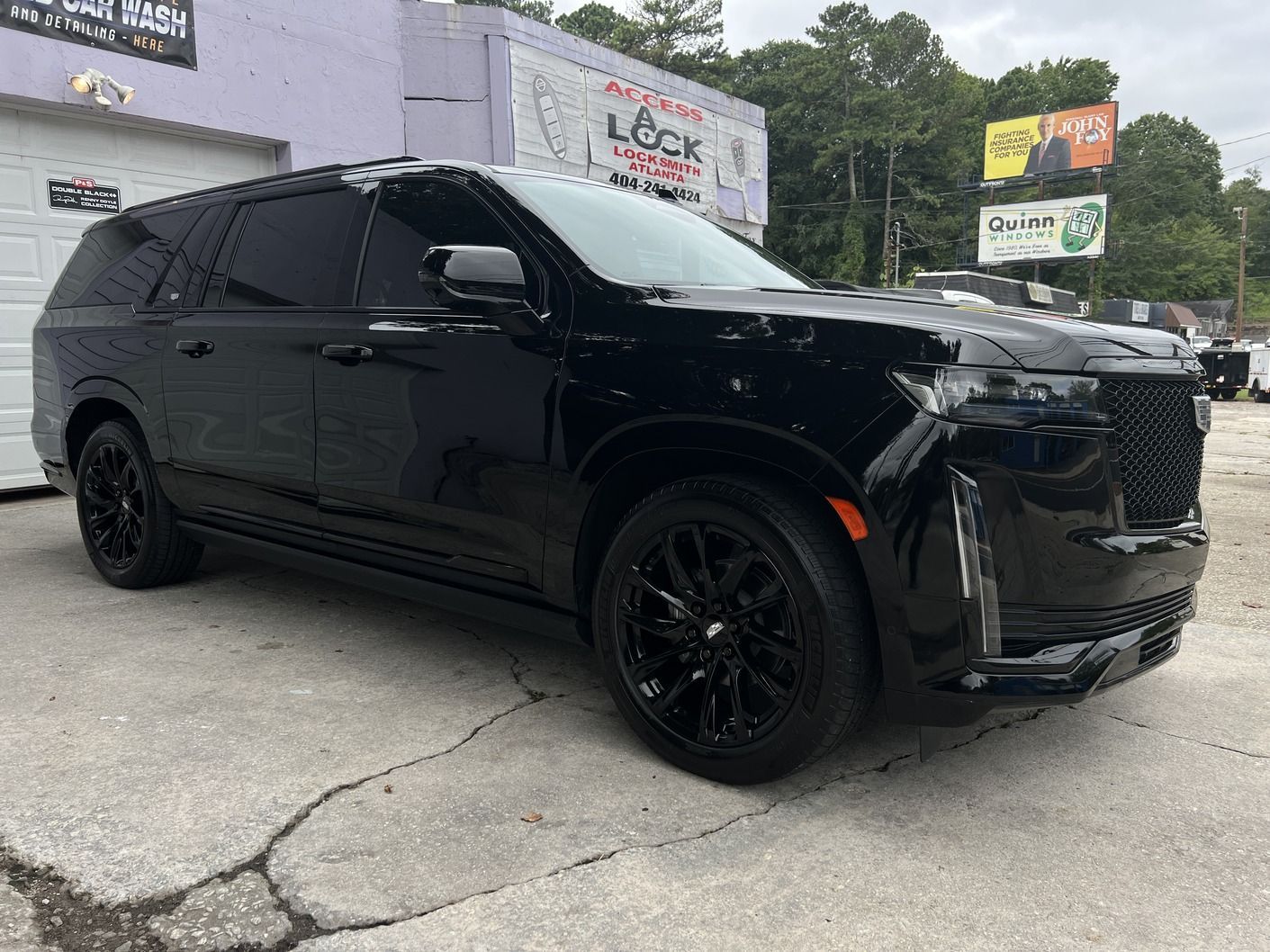 Black Cadillac SUV paint correction
