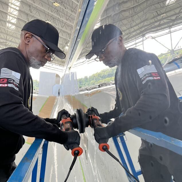 Yasir Polishing Air Force One Jet