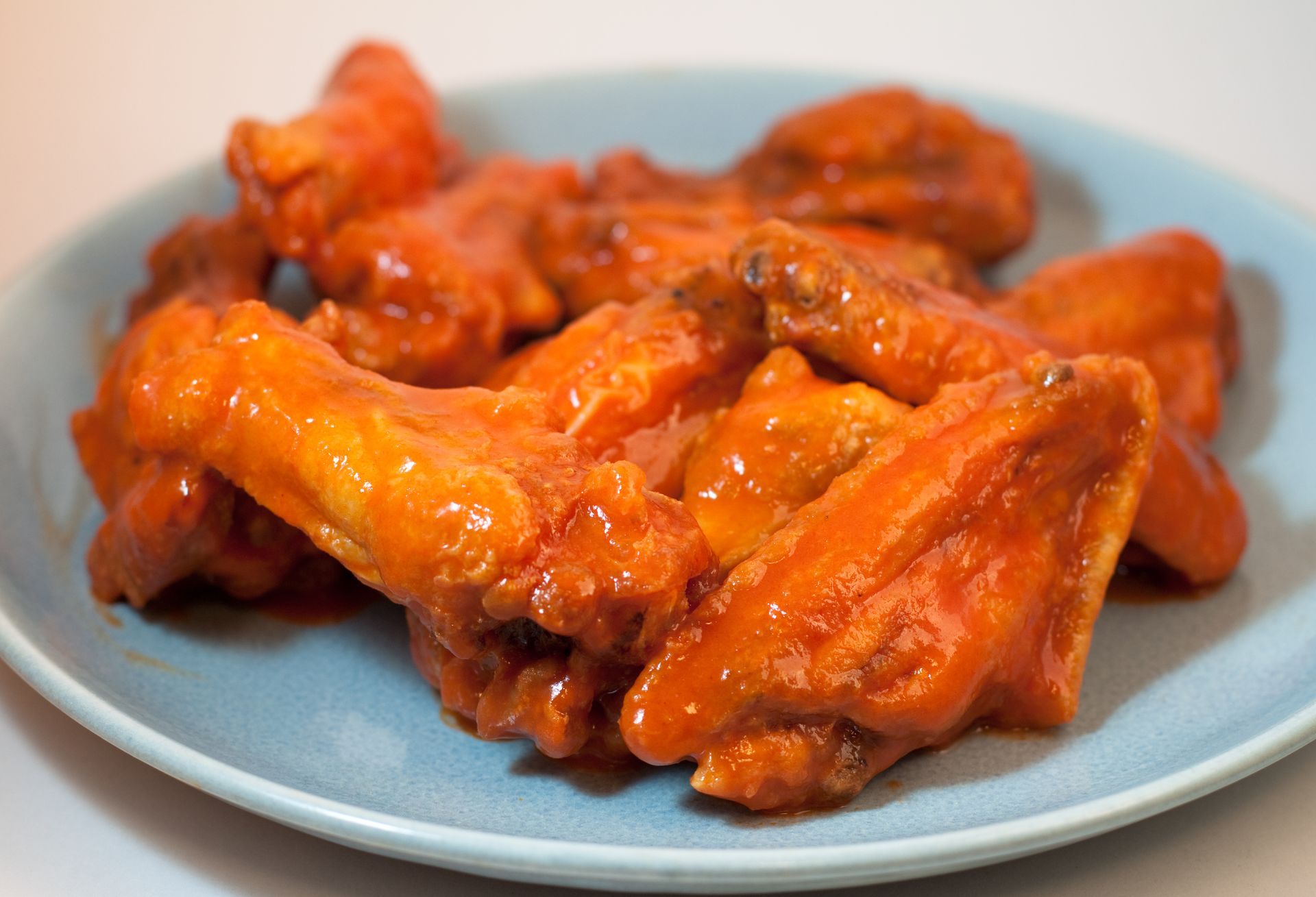 A pizza with pepperoni and cheese on a white background