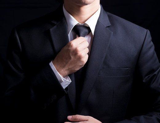 Business man adjusting tie business man adjusting tie