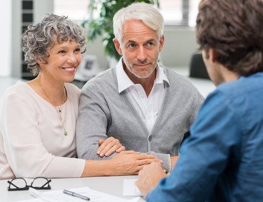 Senior couple talking to accountant senior couple talking to accountant