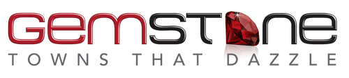 A red and black logo for gemstone towns that dazzle