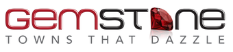 A red and black logo for gemstone towns that dazzle