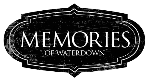 A black and white logo for memories of waterdown.