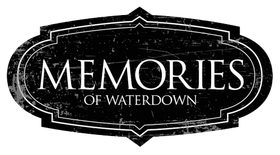 A black and white logo for memories of waterdown.