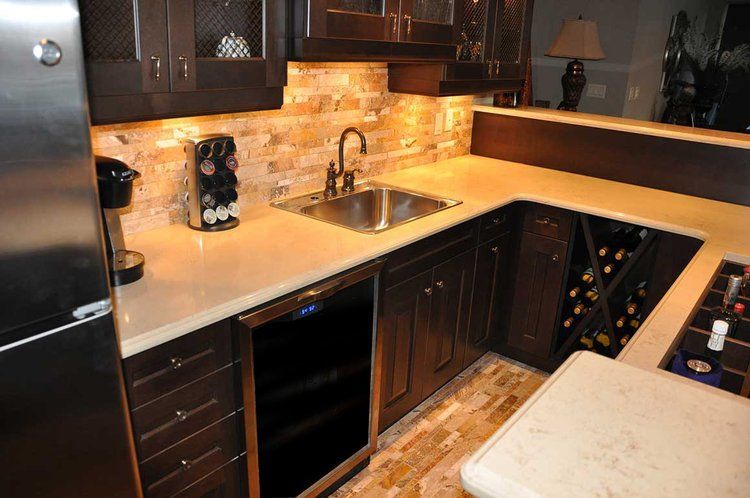 A kitchen with stainless steel appliances and a sink