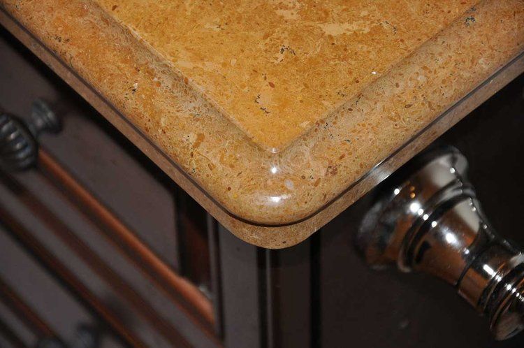 A close up of a counter top with a corner.
