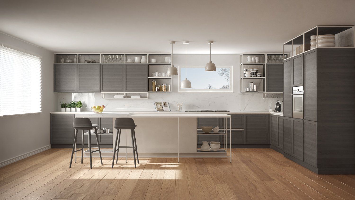 A modern kitchen with gray cabinets and wooden floors.