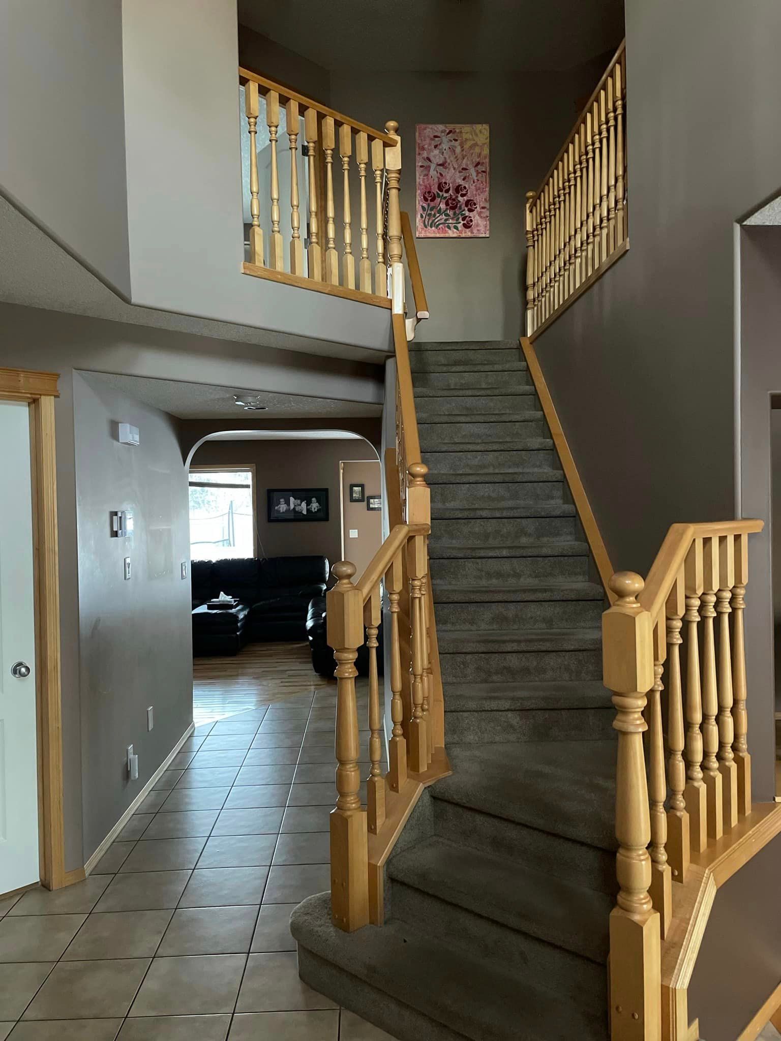 A staircase leading up to the second floor of a house