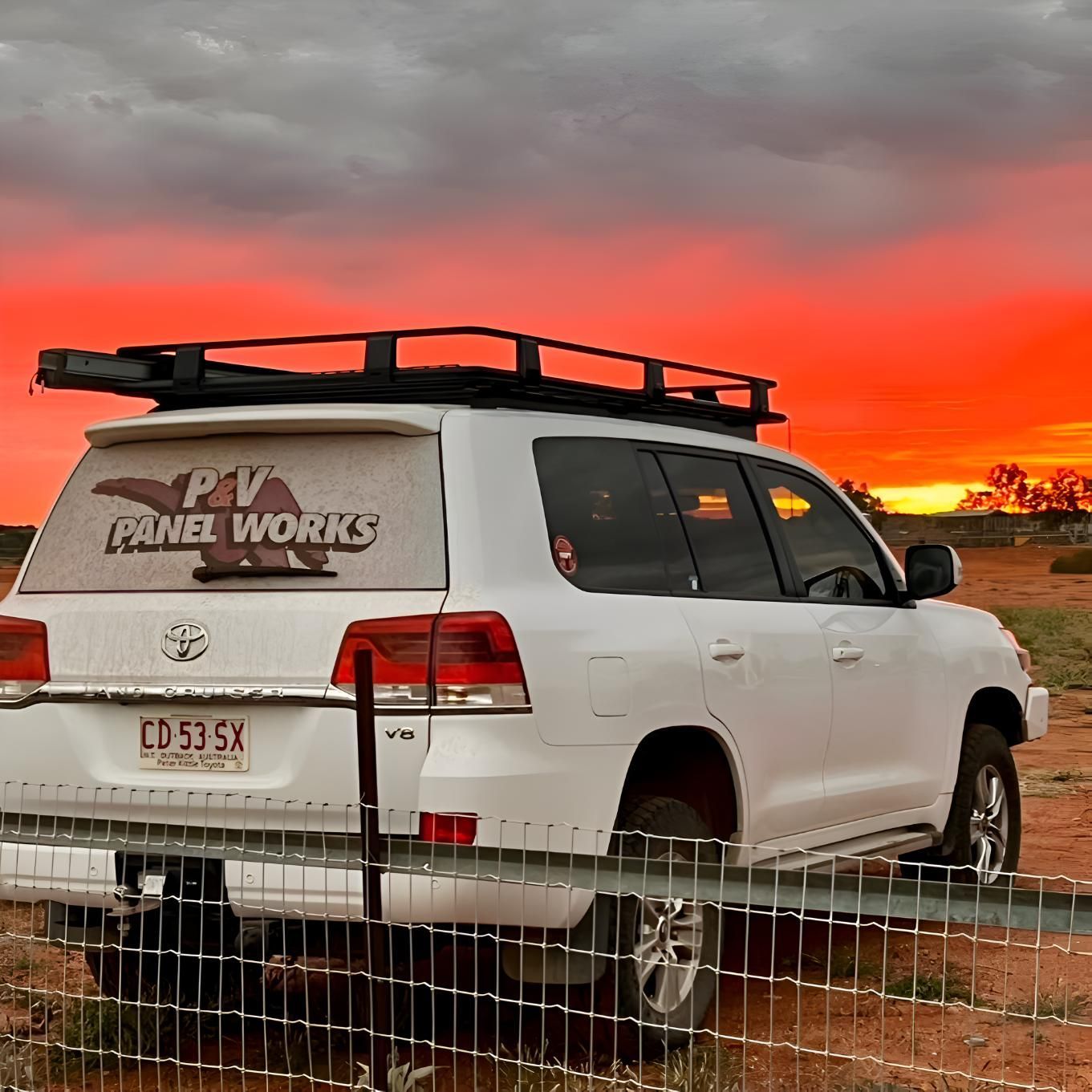 A White SUV With The Word Panel Works On The Back — P & V Panel Works In Alice Springs, NT