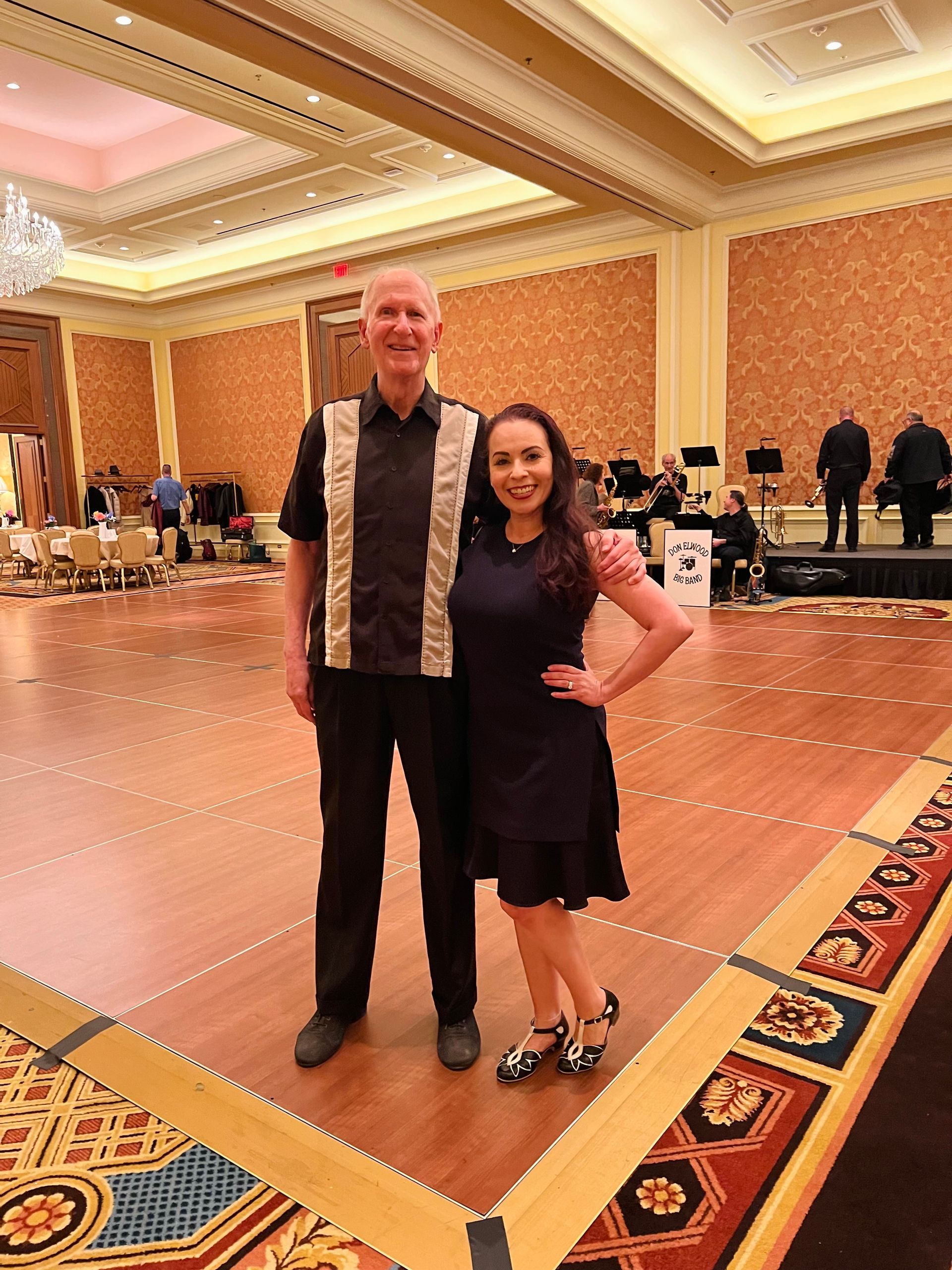 A woman is holding three boxes of dermalogica products in her hands.