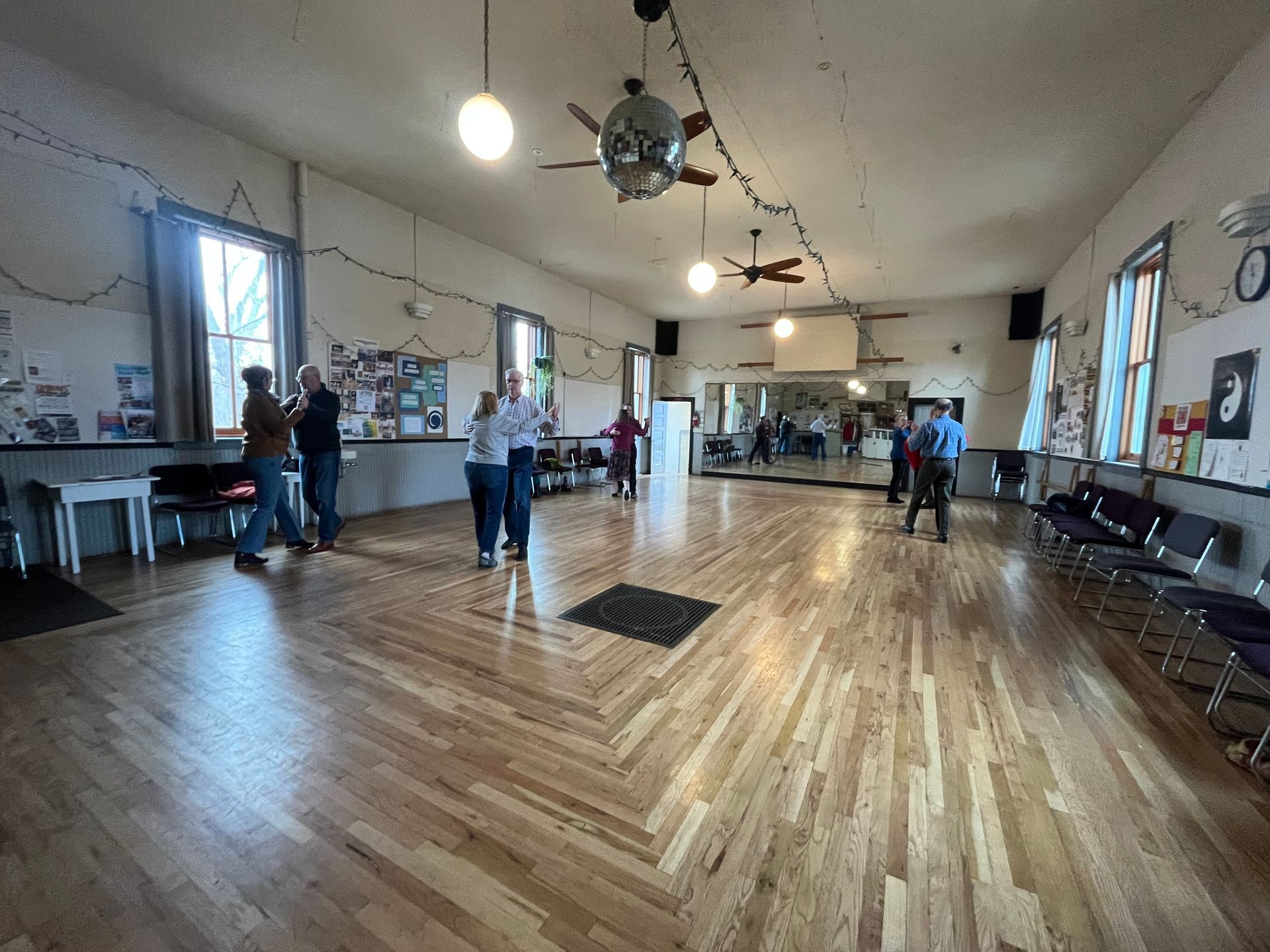 A woman is holding three boxes of dermalogica products in her hands.