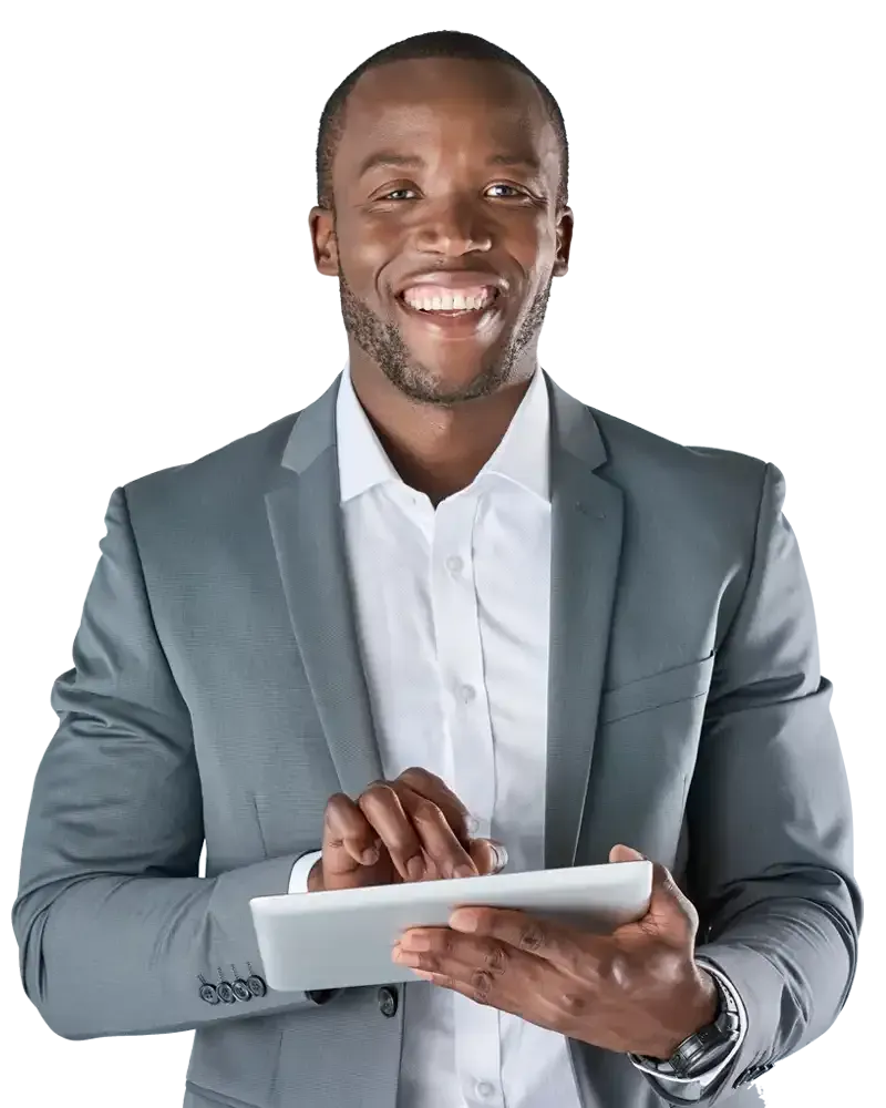 Smiling professional in a gray suit using a tablet against a white background