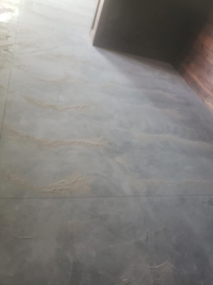 Gray and brown marbled tile floor
