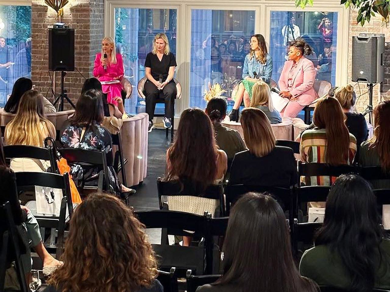 Kimberley Caines speaking at Genea's 