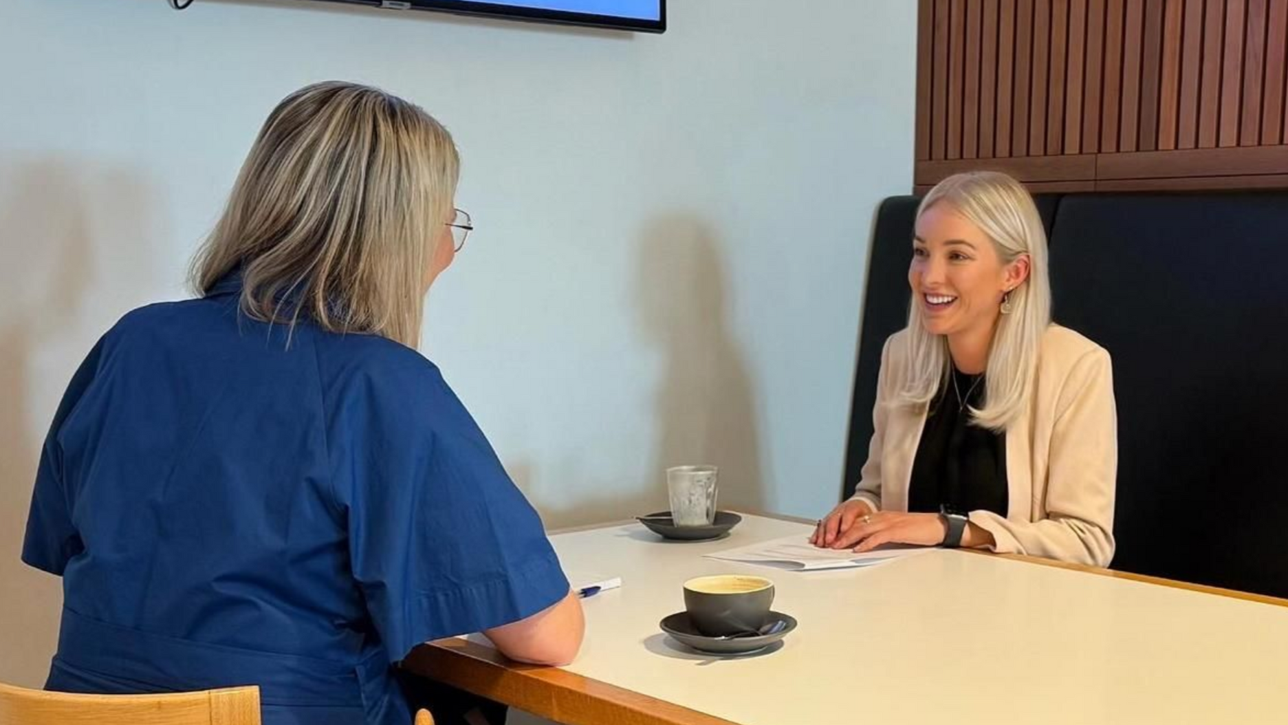 Kimberley Caines meeting a senior policy adviser in Parliament House.
