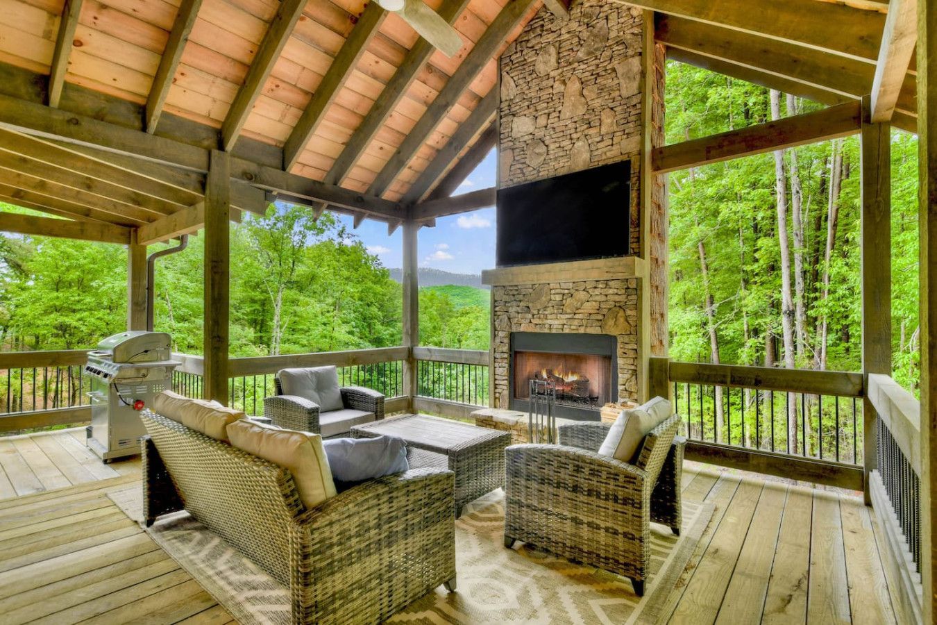 Outdoor living area of a cabin that Mountain Escapes manages for vacation rental