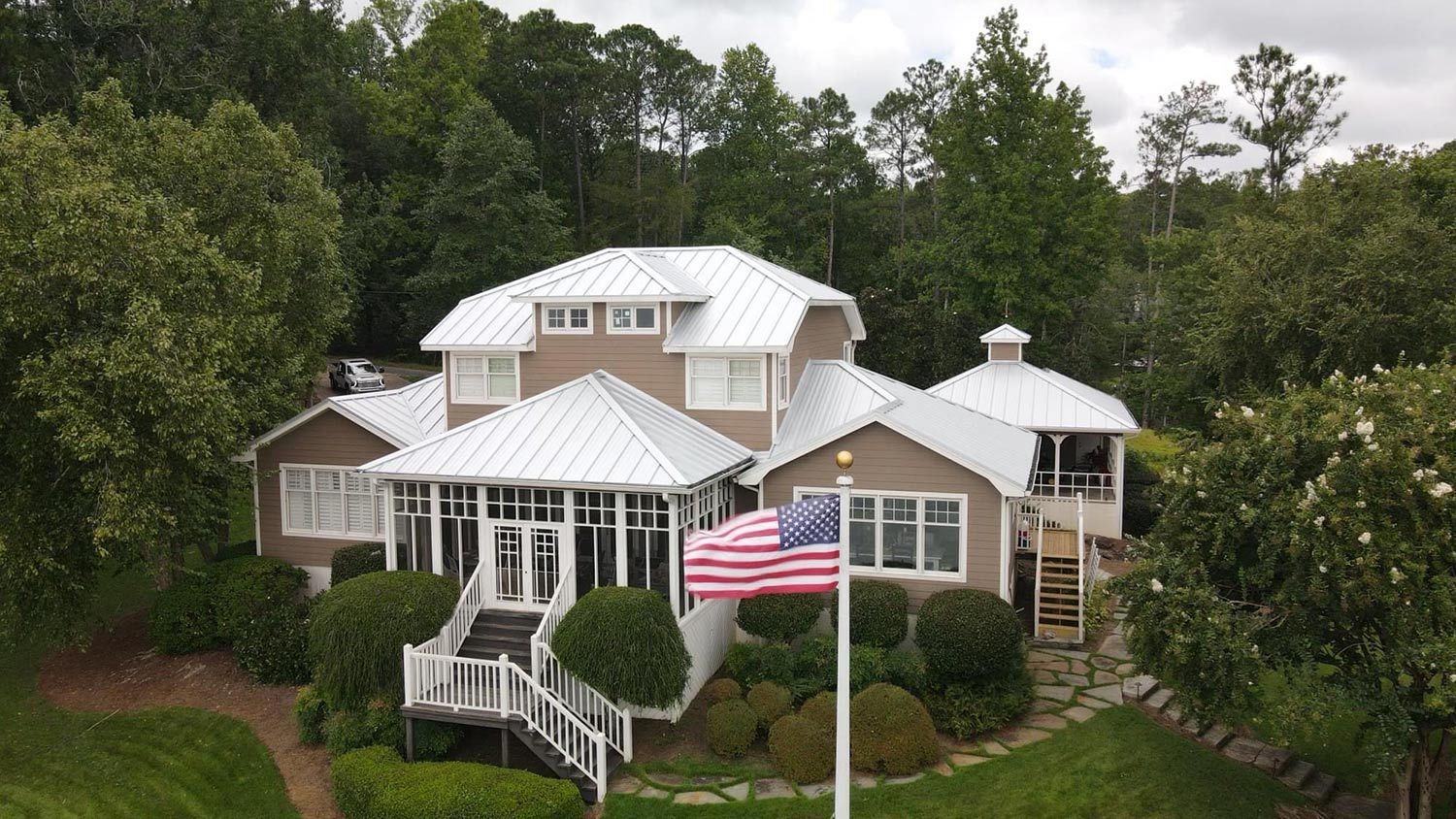 House with white metal roof