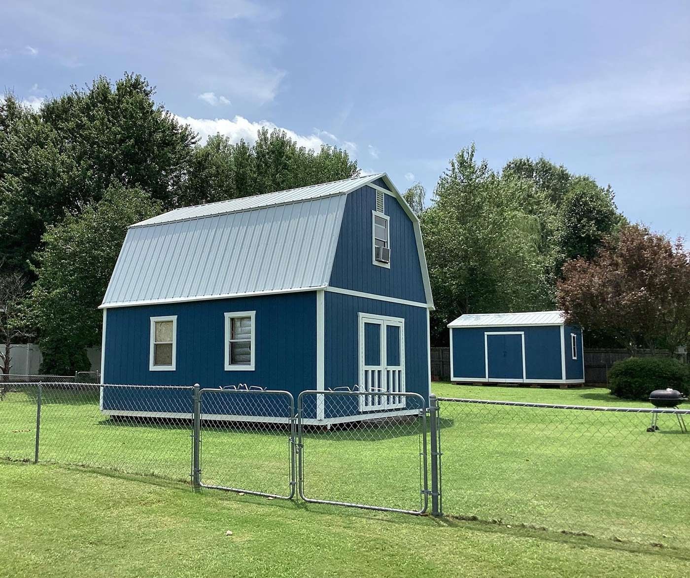 Blue barn with metal roof