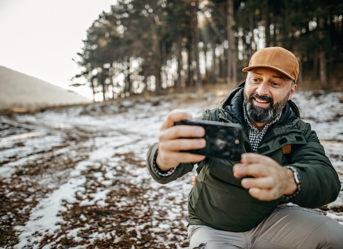 man taking picture | Dental Bonding in Oelwein IA