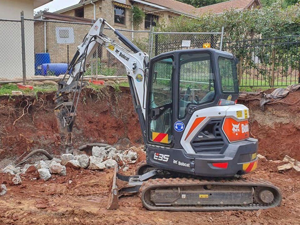 Excavator Digging Dirt For Pool — Excavation in Southern Highlands, NSW