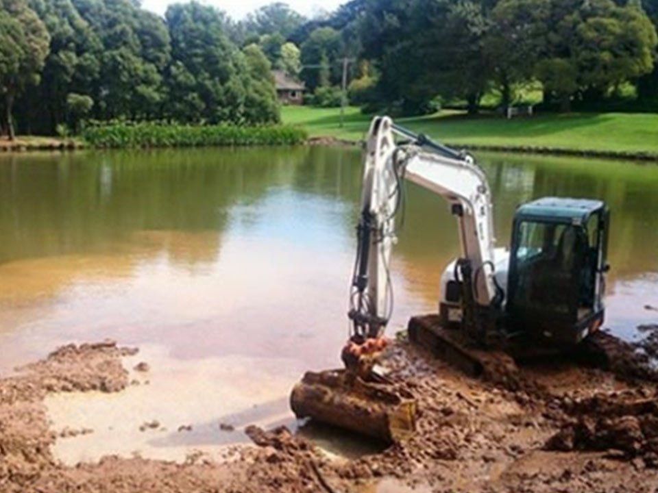 Excavator Digging Near lake — Excavation in Southern Highlands, NSW
