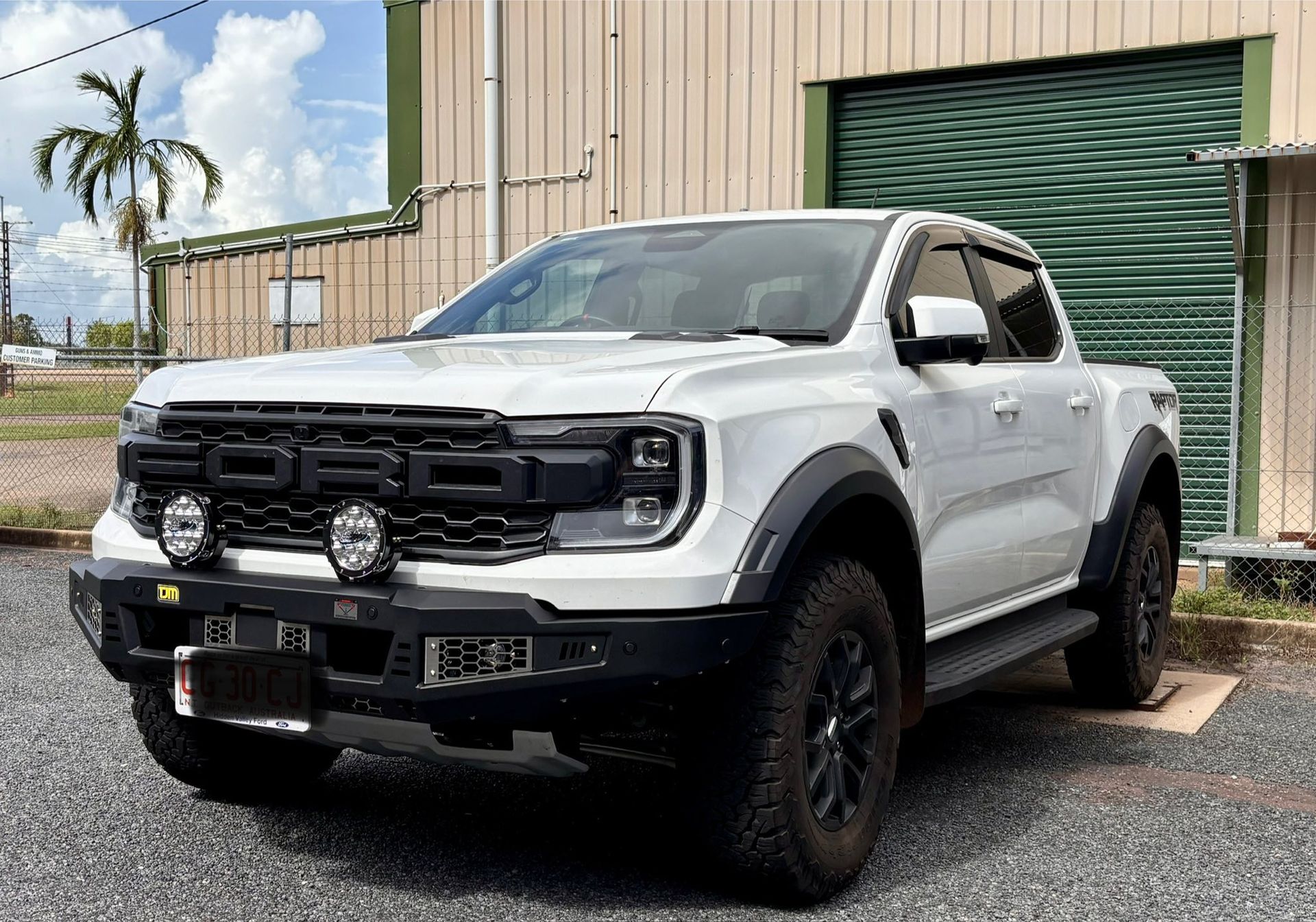 White Ford Ranger pickup truck with black accents and off-road modifications parked in front of a building. — Prestige Automotive NT In Katherine, NT