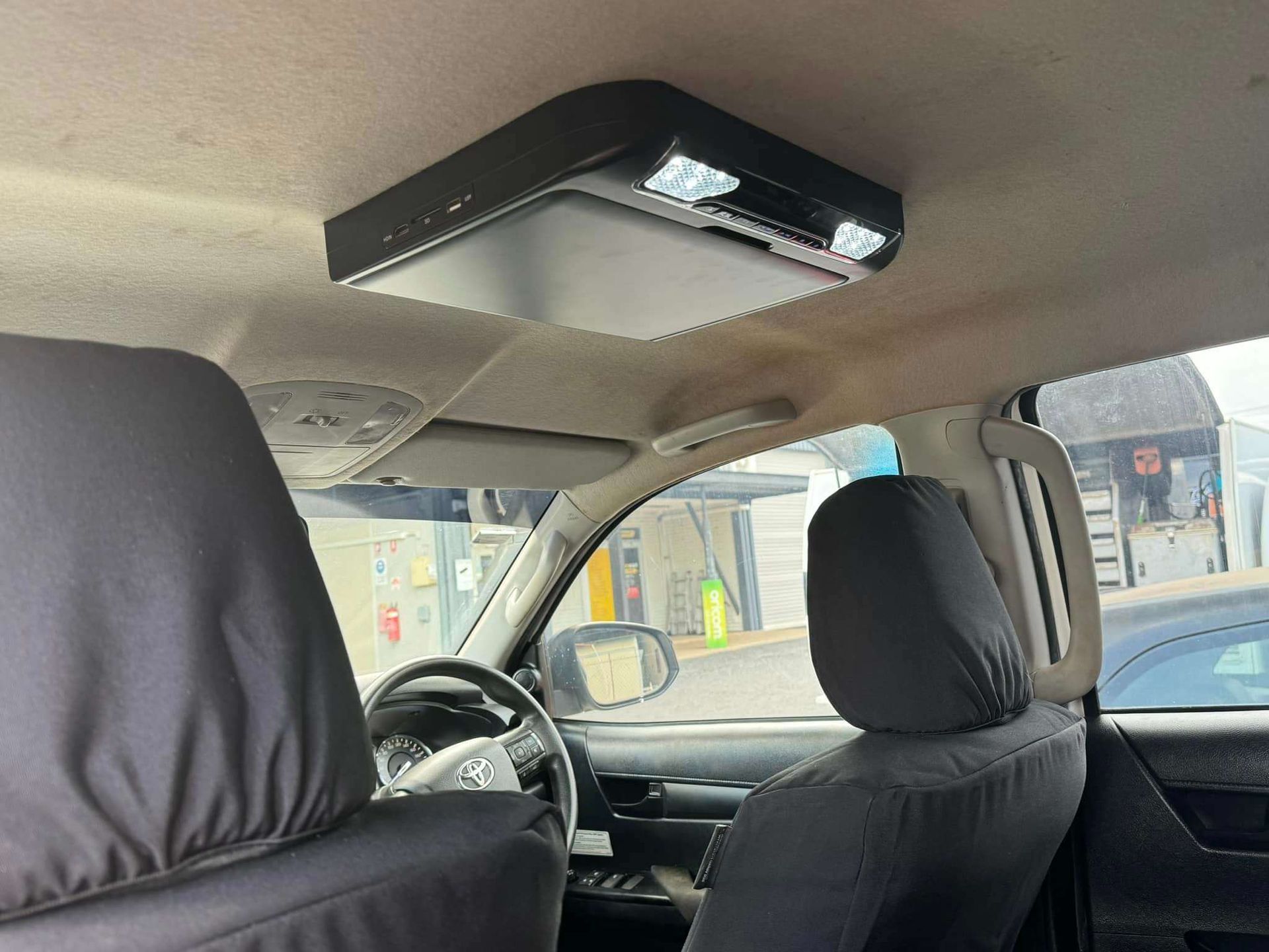 The Inside Of A Car With A Ceiling Mounted Dvd Player — Prestige Automotive NT In Yarrawonga, NT