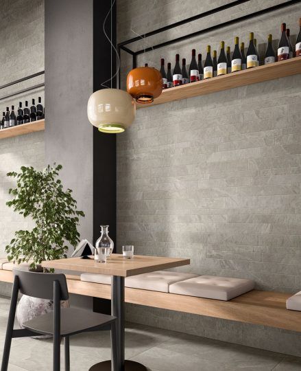 Restaurant Interior With a Wooden Table and Seating — Stone Arc in Kincumber, NSW