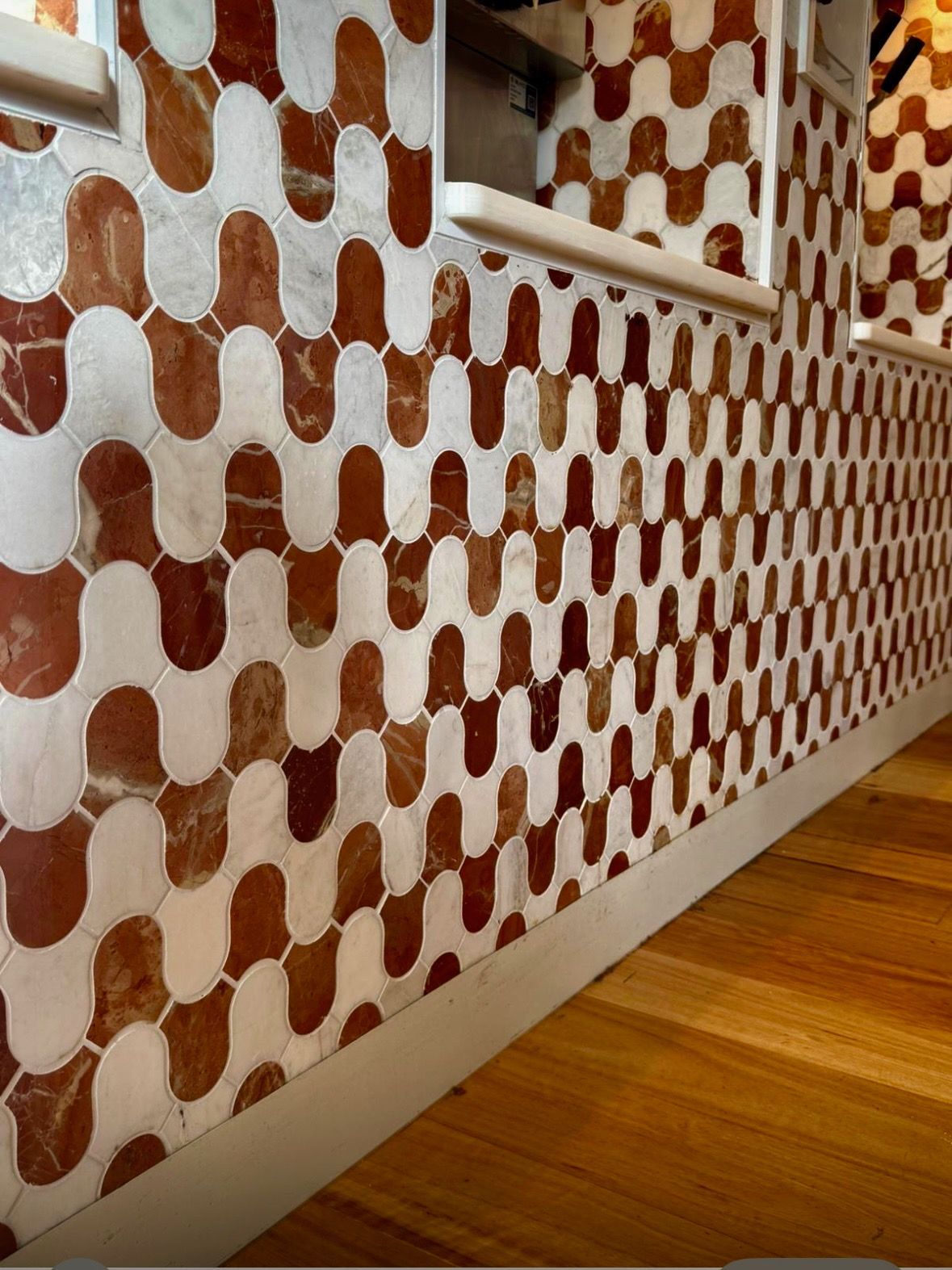 White and Reddish-Brown Patterned Marble Wall With a Wave-Like Design— Stone Arc in Kincumber, NSW