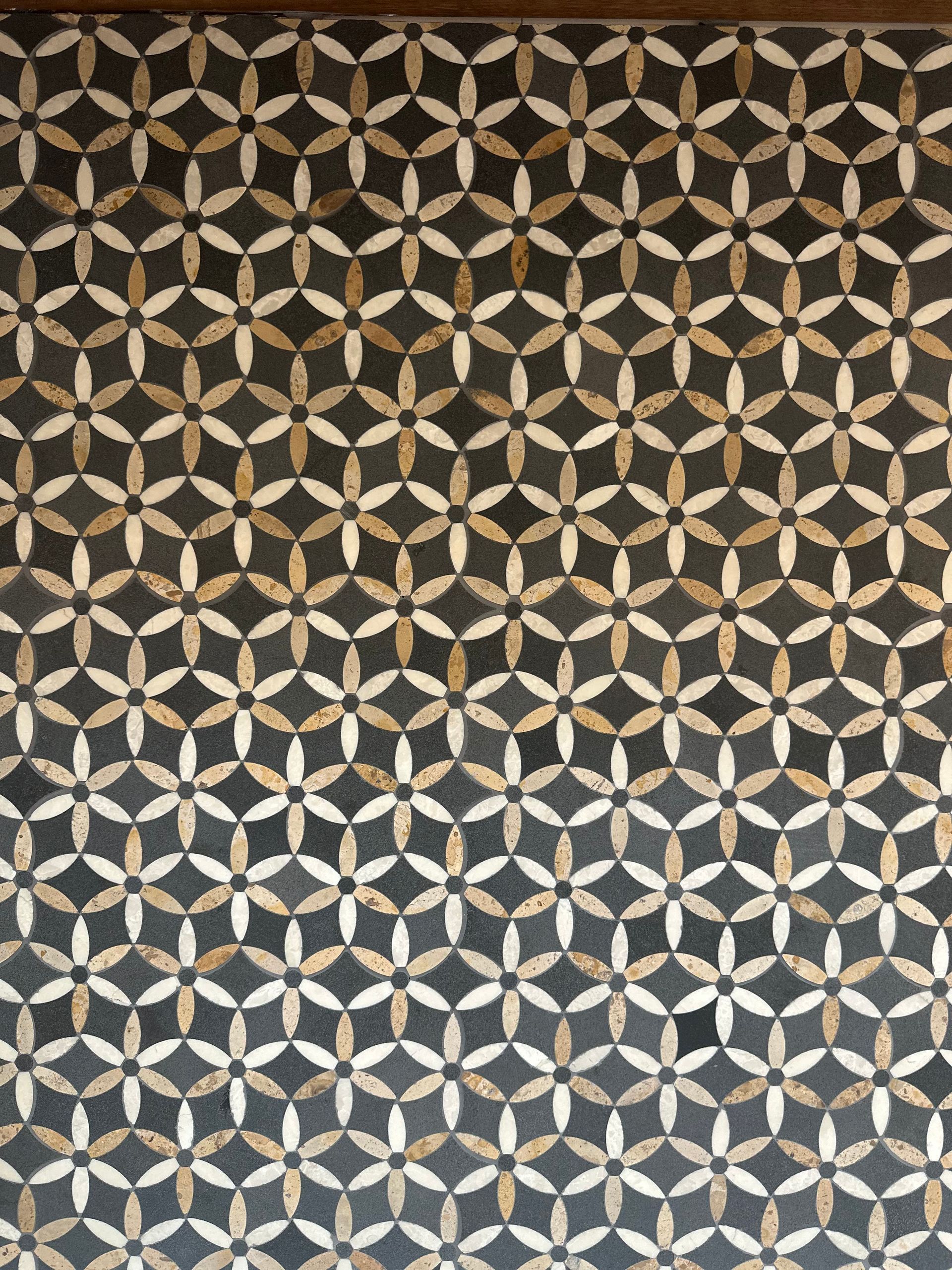 Dark Gray Patterned Floor With Cream and White Floral Shapes — Stone Arc in Kincumber, NSW