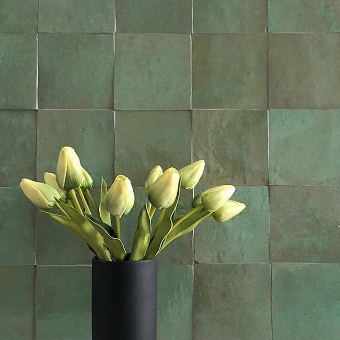 A Bouquet of Yellow Tulips in a Black Vase — Stone Arc in Kincumber, NSW