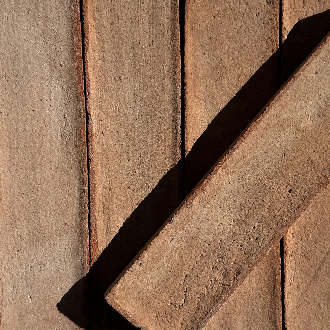 Close-Up of Stacked, Reddish-Brown Rectangular Bricks — Stone Arc in Kincumber, NSW