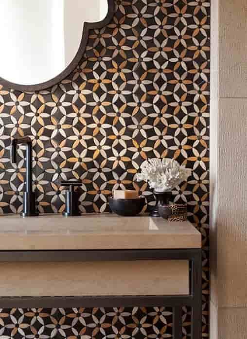 A Bathroom With A Sink And A Mirror With A Floral Pattern On The Wall  — Stone Arc in Kincumber, NSW