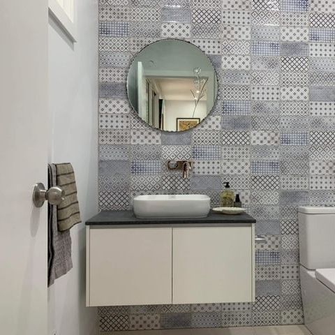 A Bathroom With A Sink , Toilet , And Mirror  — Stone Arc in Kincumber, NSW