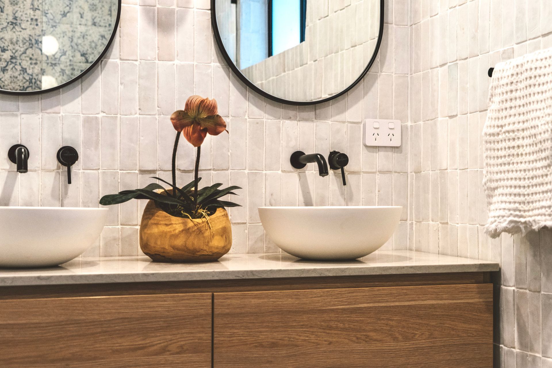 A Bathroom With Two Sinks And Two Mirrors  — Stone Arc in Kincumber, NSW