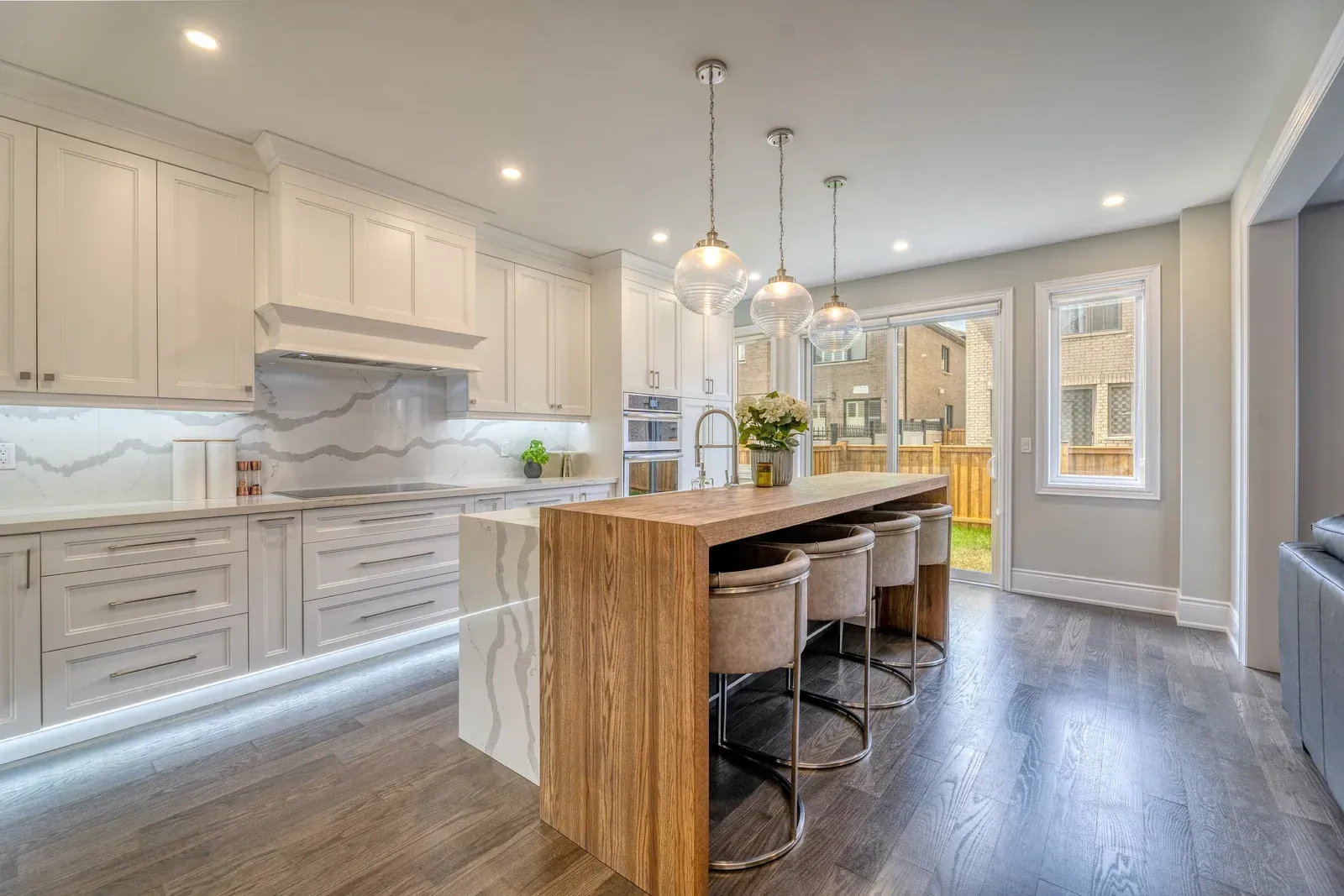 There is a large island in the middle of the kitchen.