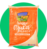 A bag of sugar is sitting on top of a green circle.