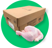 A chicken leg is sitting next to a box of chicken.