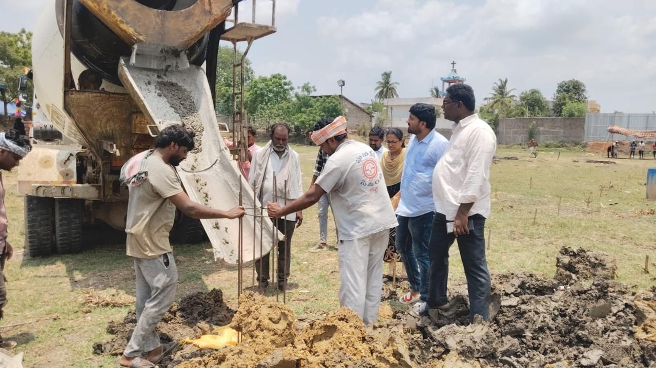Workers applying ready mix