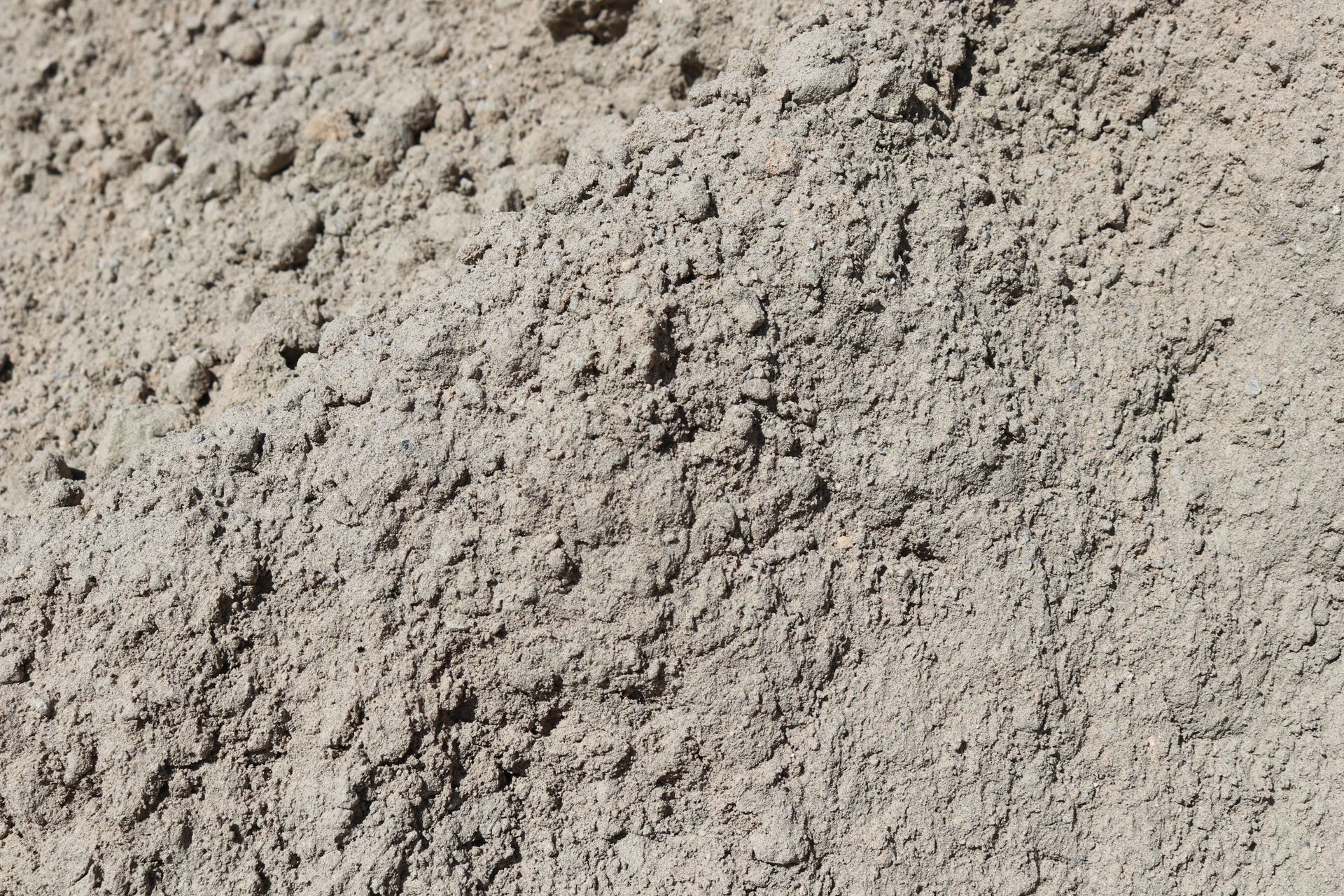 A close up of a pile of white sand.