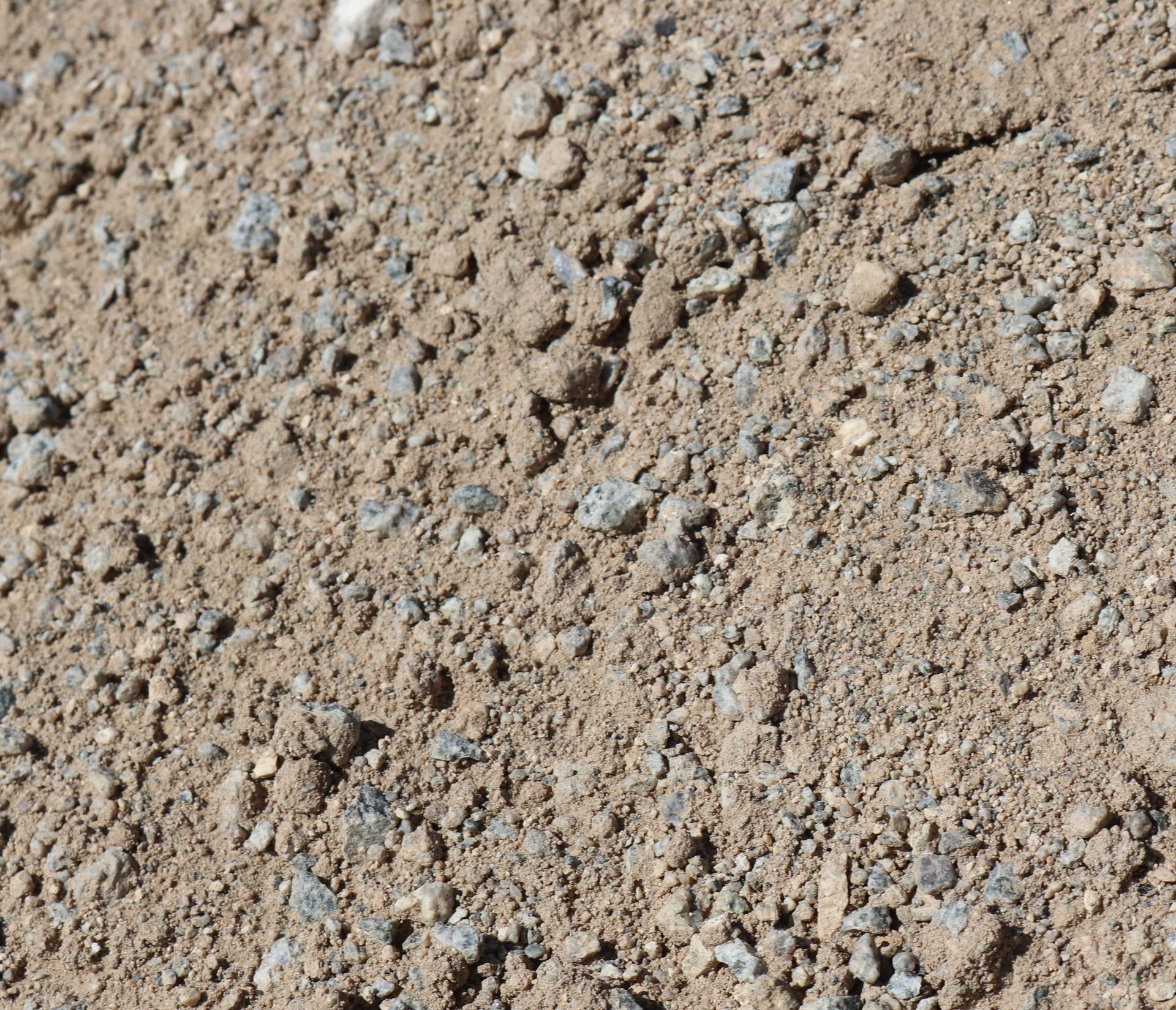 A close up of a pile of dirt and rocks.
